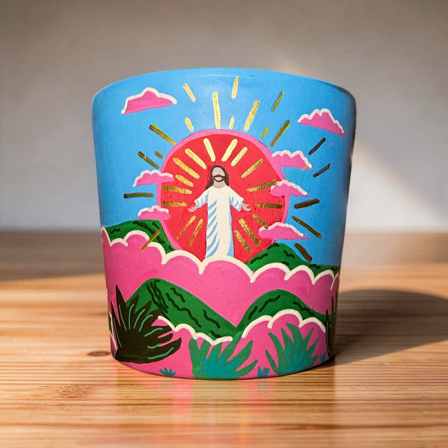 Jesus behind sunset